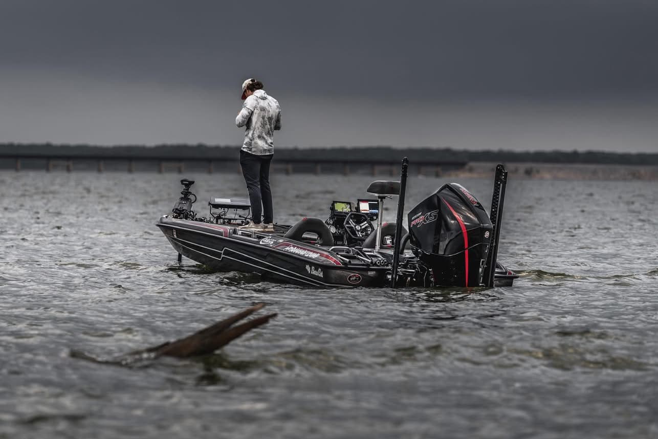 Ryan Heine working a storm front from the bow of his bass boat